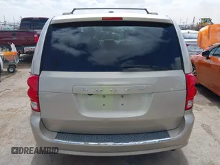 2014 Dodge Grand Caravan SXT with VIN 2C4RDGCG6ER466459, listed as a IAAI auction lot 41820907 with 105,404 mi miles and . Bid and sale history available at DreamBid. Image 15.