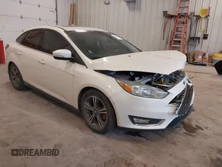 2015 Ford Focus Titanium with VIN 1FADP3J27FL280611, listed as a IAAI auction lot 42398884 with 155,070 mi miles and . Bid and sale history available at DreamBid. Image 1.