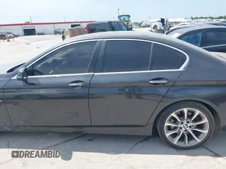 2014 BMW 5 Series 535i with VIN WBA5B1C51ED475795, listed as a IAAI auction lot 42028184 with 119,692 mi miles. Bid and sale history available at carsss.com. Image 14.