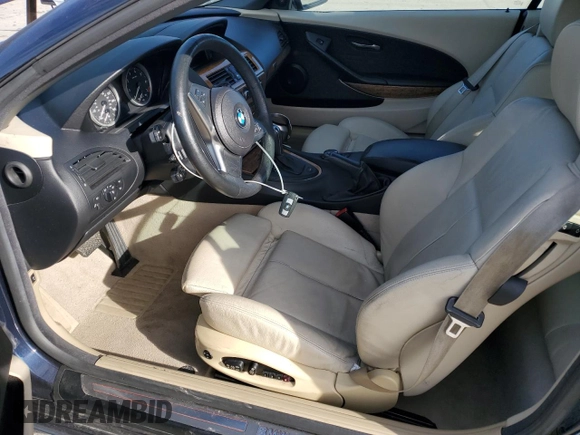 2006 BMW 6 Series 650Ci z VIN WBAEK13486CN78310, wystawiony jako Copart lot #88367535 z przebiegiem 97 566 mil mil oraz Szkody całkowita. Historia ofert i sprzedaży dostępna na DreamBid. Obrazek 7.