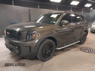 2024 Kia Telluride SX Prestige X-Line with VIN 5XYP5DGC0RG421909, listed as a IAAI auction lot 42298822 with 26,073 mi miles and . Bid and sale history available at DreamBid. Image 2.