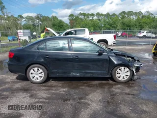 2013 Volkswagen Jetta SE z VIN 3VWDX7AJ4DM396477, wystawiony jako IAAI lot #42659959 z przebiegiem 115 833 mil mil oraz . Historia ofert i sprzedaży dostępna na DreamBid. Obrazek 13.