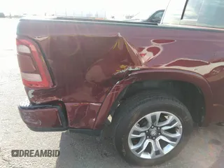 2023 Ram 1500 Limited with VIN 1C6SRFHT2PN542365, listed as a IAAI auction lot 41898998 with 26,607 mi miles and . Bid and sale history available at DreamBid. Image 6.