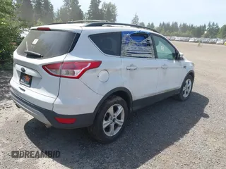 2014 Ford Escape SE z VIN 1FMCU9GX0EUC02583, wystawiony jako IAAI lot #42197013 z przebiegiem Nie podano mil oraz . Historia ofert i sprzedaży dostępna na DreamBid. Obrazek 4.
