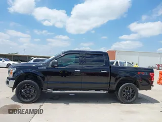 2019 Ford F-150 XL with VIN 1FTEW1E59KKE90346, listed as a IAAI auction lot 42188308 with 130,992 mi miles and . Bid and sale history available at DreamBid. Image 14.
