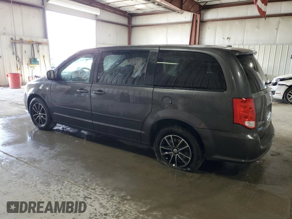 2014 Dodge Grand Caravan SE with VIN 2C4RDGBG6ER463529, listed as a Copart auction lot 51830695 with 105,675 mi miles and Salvage Title. Bid and sale history available at DreamBid. Image 2.