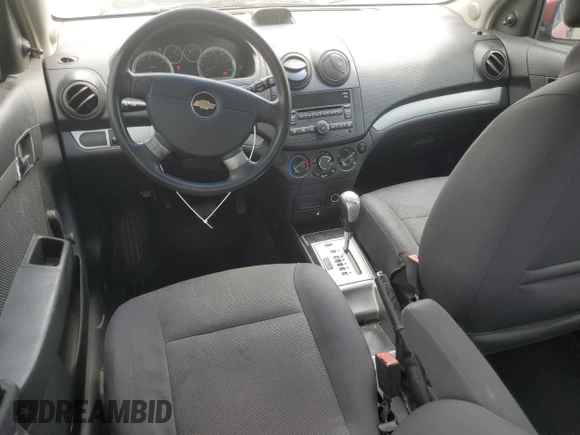 2009 Chevrolet Aveo 1LT z VIN KL1TD56E39B310766, wystawiony jako Copart lot #54663775 z przebiegiem 153 920 mil mil oraz Szkody całkowita. Historia ofert i sprzedaży dostępna na DreamBid. Obrazek 8.