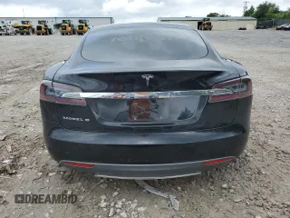 2014 Tesla Model S 60 with VIN 5YJSA1H11EFP65266, listed as a Copart auction lot 60934805 with 93,546 mi miles and Salvage title. Bid and sale history available at DreamBid. Image 6.