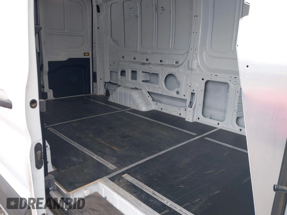 2022 Ford Transit Cargo with VIN 1FTBR1C83NKA78404, listed as a IAAI auction lot 40335158 with 31,273 mi miles and . Bid and sale history available at DreamBid. Image 8.