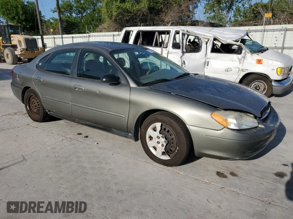 2003 Ford Taurus LX Standard with VIN 1FAFP52U13G243207, listed as a Copart auction lot 52763905 with 49,906 mi miles and Salvage title. Bid and sale history available at DreamBid. Image 4.
