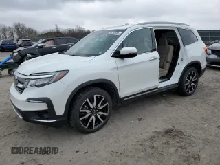2020 Honda Pilot Touring 7-Passenger z VIN 5FNYF6H67LB017672, wystawiony jako Copart lot #46180965 z przebiegiem Nie podano mil oraz Szkoda całkowita • Salvage title. Historia ofert i sprzedaży dostępna na DreamBid. Obrazek 1.