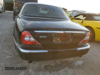 2004 Jaguar XJ with VIN SAJWA71C04SG31354, listed as a Copart auction lot 73742404 with 0 mi miles and Non Repairable. Bid and sale history available at carsss.com. Image 6.