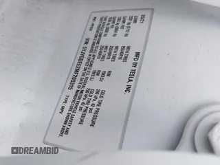 2021 Tesla Model Y Long Range z VIN 5YJYGDEE2MF200315, wystawiony jako IAAI lot #42233599 z przebiegiem 38 742 mil mil oraz . Historia ofert i sprzedaży dostępna na DreamBid. Obrazek 9.