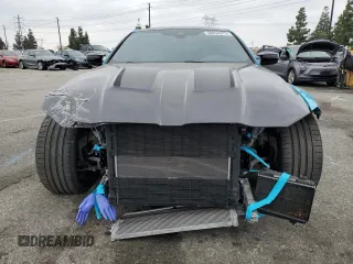 2021 BMW M4 with VIN WBS53AZ0XMCG52209, listed as a Copart auction lot 50234375 with 19,701 mi miles and Salvage title. Bid and sale history available at DreamBid. Image 5.