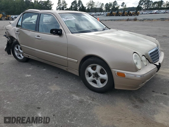 2001 Mercedes-Benz E-Class with VIN WDBJF70JX1B194075, listed as a Copart auction lot 70482944 with 218,319 mi miles and Salvage Title. Bid and sale history available at carsss.com. Image 4.