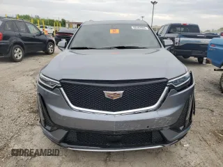 2021 Cadillac XT6 AWD Sport z VIN 1GYKPHRS9MZ165189, wystawiony jako Copart lot #58482665 z przebiegiem Nie podano mil oraz Szkoda całkowita • Salvage title. Historia ofert i sprzedaży dostępna na DreamBid. Obrazek 5.