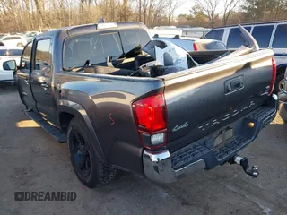 2018 Toyota Tacoma SR with VIN 5TFCZ5AN7JX154112, listed as a IAAI auction lot 41394058 with 158,045 mi miles. Bid and sale history available at carsss.com. Image 3.