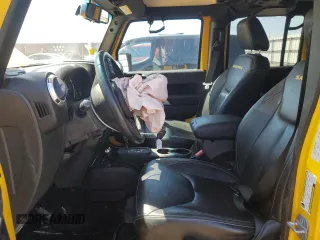 2015 Jeep Wrangler Unlimited Sahara with VIN 1C4HJWEG7FL593355, listed as a Copart auction lot 56784425 with 74,498 mi miles and Salvage title. Bid and sale history available at DreamBid. Image 7.