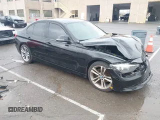 2015 BMW 3 Series 328i with VIN WBA3A5G51FNS83378, listed as a IAAI auction lot 41719392 with 114,146 mi miles. Bid and sale history available at carsss.com. Image 1.