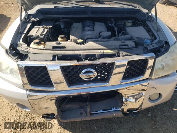 2004 Nissan Titan SE with VIN 1N6AA06AX4N506104, listed as a Copart auction lot 76545534 with 174,129 mi miles and Salvage Title. Bid and sale history available at carsss.com. Image 12.