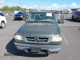 2002 Mazda B-Series 2WD Truck SX with VIN 4F4YR12D32TM21251, listed as a IAAI auction lot 41273974 with 155,165 mi miles. Bid and sale history available at carsss.com. Image 6.