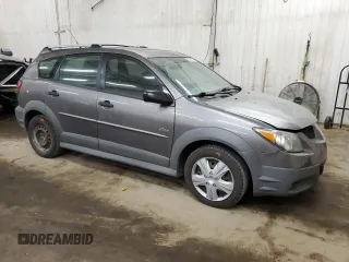 2004 Pontiac Vibe with VIN 5Y2SM62814Z439227, listed as a Copart auction lot 84260304 with 176,710 mi miles and Salvage title. Bid and sale history available at DreamBid. Image 4.