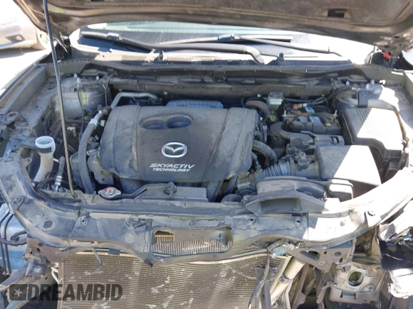 2016 Mazda CX-5 Grand Touring with VIN JM3KE2DY9G0824196, listed as a IAAI auction lot 41801887 with 88,625 mi miles. Bid and sale history available at carsss.com. Image 10.