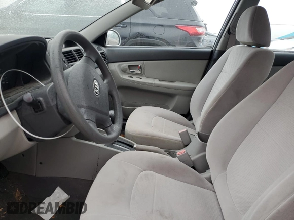 2009 Kia Spectra SX with VIN KNAFE221195656606, listed as a Copart auction lot 84694524 with Not Provided miles and Salvage Title. Bid and sale history available at carsss.com. Image 7.