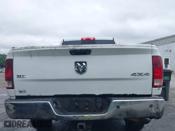 2013 Ram 2500 SLT z VIN 3C6TR5DT7DG524758, wystawiony jako IAAI lot #42333873 z przebiegiem Nie podano mil oraz . Historia ofert i sprzedaży dostępna na DreamBid. Obrazek 17.