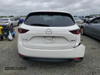 2020 Mazda CX-5 Touring with VIN JM3KFACM0L0857278, listed as a Copart auction lot 51980825 with 73,411 mi miles and Salvage Title. Bid and sale history available at carsss.com. Image 6.