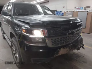 2015 Chevrolet Tahoe LT z VIN 1GNSCBKC1FR228488, wystawiony jako IAAI lot #41933869 z przebiegiem 164 523 mil mil oraz . Historia ofert i sprzedaży dostępna na DreamBid. Obrazek 6.