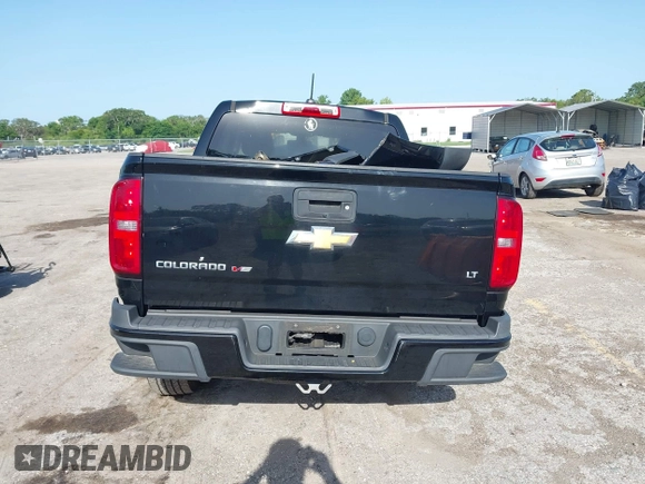 2018 Chevrolet Colorado 4WD LT z VIN 1GCGTCEN0J1265248, wystawiony jako IAAI lot #42247568 z przebiegiem 74 863 mil mil oraz . Historia ofert i sprzedaży dostępna na DreamBid. Obrazek 17.