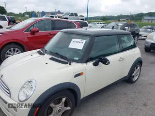 2006 MINI Hardtop with VIN WMWRC33566TK73763, listed as a IAAI auction lot 42782654 with 103,751 mi miles and . Bid and sale history available at DreamBid. Image 6.