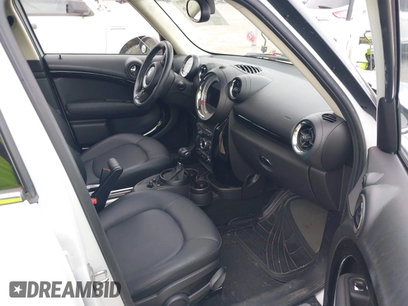 2014 MINI Countryman with VIN WMWZB3C5XEWR37594, listed as a IAAI auction lot 42500466 with 67,589 mi miles and . Bid and sale history available at DreamBid. Image 5.