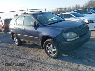 1999 Lexus RX 300 z VIN JT6HF10U1X0006823, wystawiony jako IAAI lot #41782556 z przebiegiem 240 877 mil mil oraz . Historia ofert i sprzedaży dostępna na DreamBid. Obrazek 1.