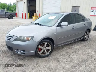 2005 Mazda 3 s with VIN JM1BK123551254112, listed as a IAAI auction lot 42153452 with 258,826 mi miles and . Bid and sale history available at DreamBid. Image 2.
