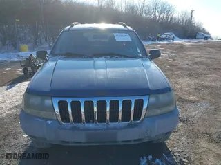 2002 Jeep Grand Cherokee Laredo with VIN 1J4GW48NX2C243282, listed as a IAAI auction lot 41362493 with 201,932 mi miles. Bid and sale history available at carsss.com. Image 6.