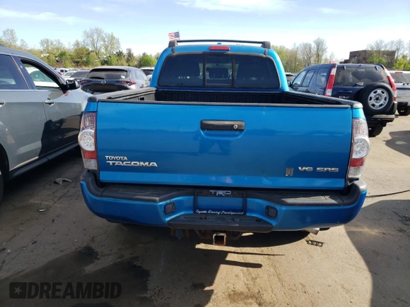 2009 Toyota Tacoma z VIN 3TMMU52N29M010275, wystawiony jako Copart lot #55341095 z przebiegiem 85 319 mil mil oraz Czysty tytuł • Clean title. Historia ofert i sprzedaży dostępna na DreamBid. Obrazek 6.