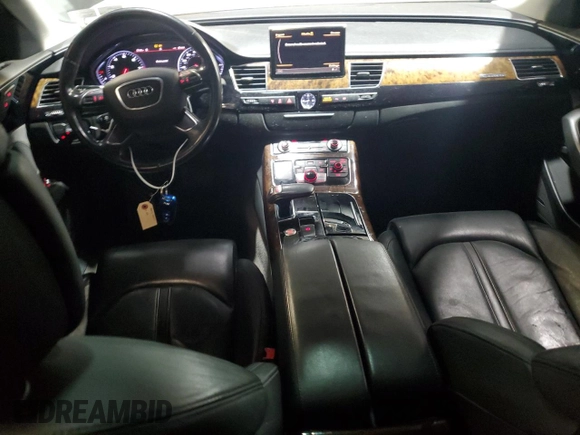2011 Audi A8 z VIN WAURVAFD7BN006275, wystawiony jako Copart lot #58306205 z przebiegiem 190 383 mil mil oraz Szkody całkowita. Historia ofert i sprzedaży dostępna na DreamBid. Obrazek 8.