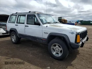 1995 Jeep Cherokee Sport z VIN 1J4FJ68S8SL650142, wystawiony jako Copart lot #51923775 z przebiegiem 329 796 mil mil oraz Czysty tytuł • Clean title. Historia ofert i sprzedaży dostępna na DreamBid. Obrazek 4.