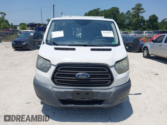 2015 Ford Transit Cargo z VIN 1FTNE1YM9FKA16926, wystawiony jako IAAI lot #42493994 z przebiegiem 218 427 mil mil oraz . Historia ofert i sprzedaży dostępna na DreamBid. Obrazek 12.