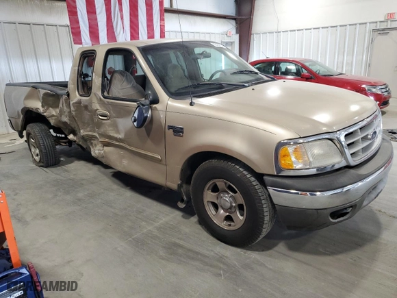 1999 Ford F-150 Work Series with VIN 1FTRX17W9XNB05202, listed as a Copart auction lot 72732714 with 0 mi miles and Salvage Title. Bid and sale history available at carsss.com. Image 4.
