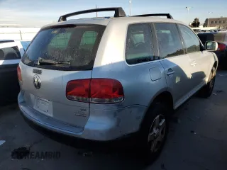 2004 Volkswagen Touareg z VIN WVGBC67L94D021426, wystawiony jako Copart lot #44059535 z przebiegiem 148 887 mil mil oraz Czysty tytuł • Clean title. Historia ofert i sprzedaży dostępna na DreamBid. Obrazek 3.