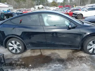2023 Tesla Model Y Long Range z VIN 7SAYGDEE8PF826989, wystawiony jako IAAI lot #41615166 z przebiegiem 10 368 mil mil oraz . Historia ofert i sprzedaży dostępna na DreamBid. Obrazek 14.