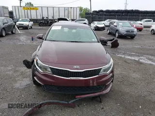 2016 Kia Optima LX with VIN 5XXGT4L31GG053429, listed as a IAAI auction lot 42464513 with 122,397 mi miles and . Bid and sale history available at DreamBid. Image 13.