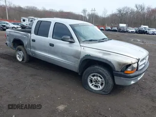 2003 Dodge Dakota Sport with VIN 1D7HG38X13S267227, listed as a IAAI auction lot 41952281 with 119,641 mi miles and . Bid and sale history available at carsss.com. Image 1.
