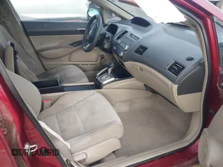 2010 Honda Civic LX z VIN 19XFA1F51AE012859, wystawiony jako IAAI lot #41770782 z przebiegiem 114 938 mil mil oraz . Historia ofert i sprzedaży dostępna na DreamBid. Obrazek 5.
