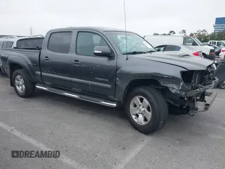 2014 Toyota Tacoma PreRunner z VIN 3TMKU4HN9EM041509, wystawiony jako IAAI lot #42441194 z przebiegiem 290 715 mil mil oraz . Historia ofert i sprzedaży dostępna na DreamBid. Obrazek 1.