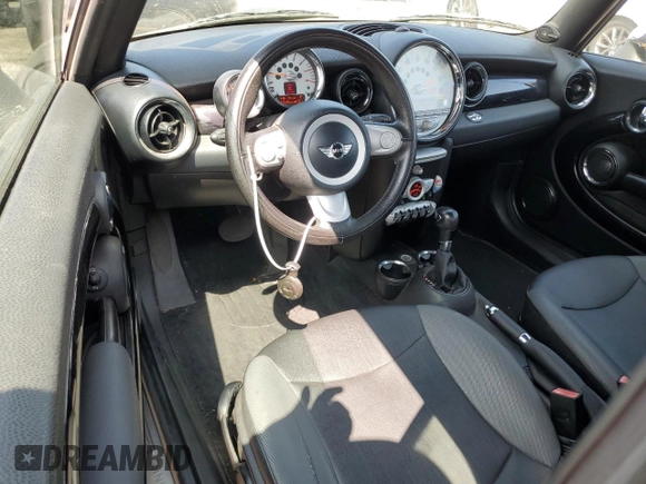 2010 MINI Convertible with VIN WMWMR3C51ATU97217, listed as a Copart auction lot 67732714 with 127,880 mi miles and Clean Title. Bid and sale history available at DreamBid. Image 8.
