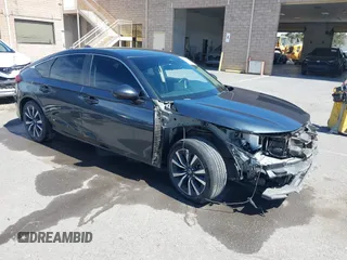 2023 Honda Civic EX-L with VIN 19XFL1H79PE001562, listed as a IAAI auction lot 42024296 with 42,500 mi miles and . Bid and sale history available at DreamBid. Image 1.